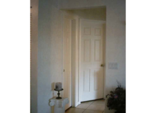 Custom Faux paint
Entrance to bedrooms and bath with linen closet